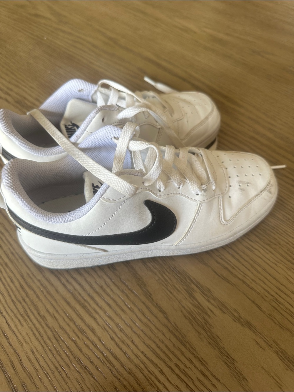 Nike White Kids Sneakers with Black Swoosh